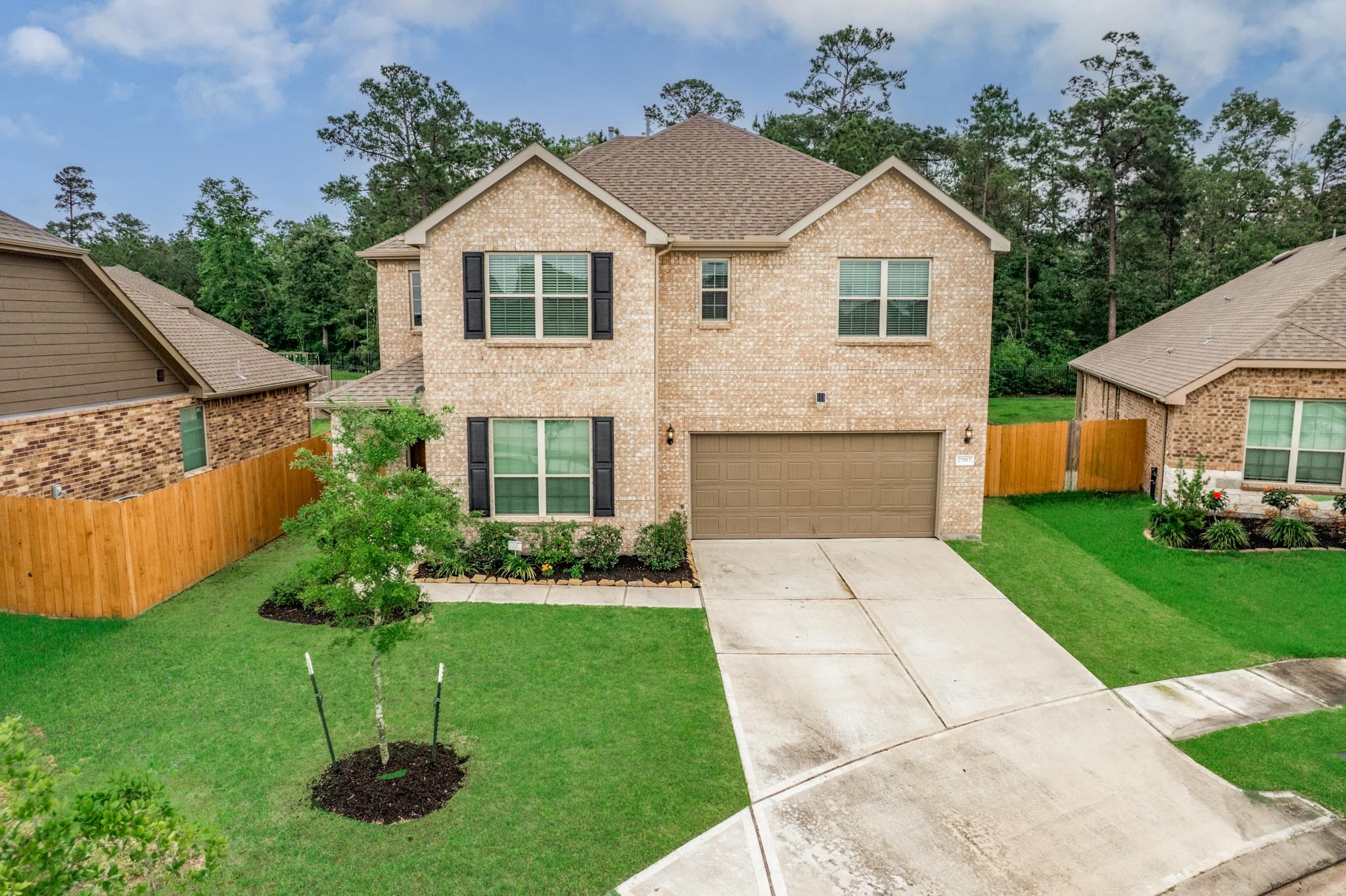 27817 Ellie Oak Lane Spring, TX 77386 - Photo 44 of 49 a front view of a house with a yard