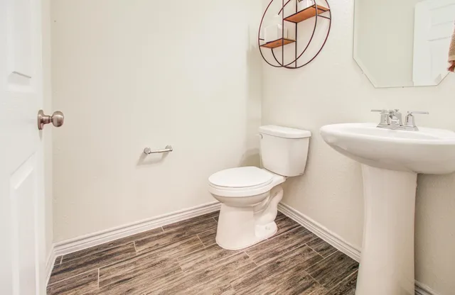 a bathroom with a sink and a toilet