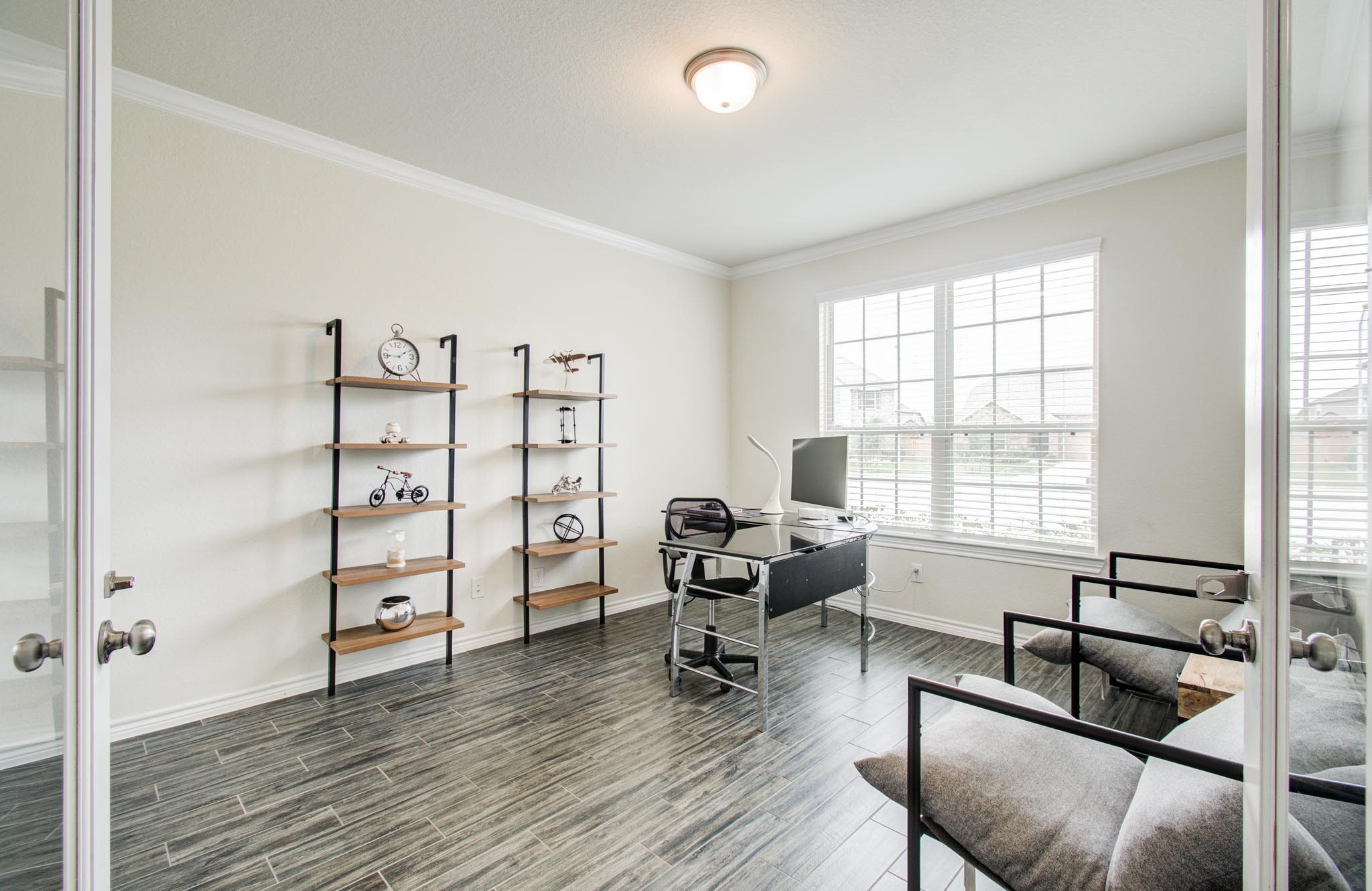 27817 Ellie Oak Lane Spring, TX 77386 - Photo 10 of 49 a view of a livingroom with workspace and a window