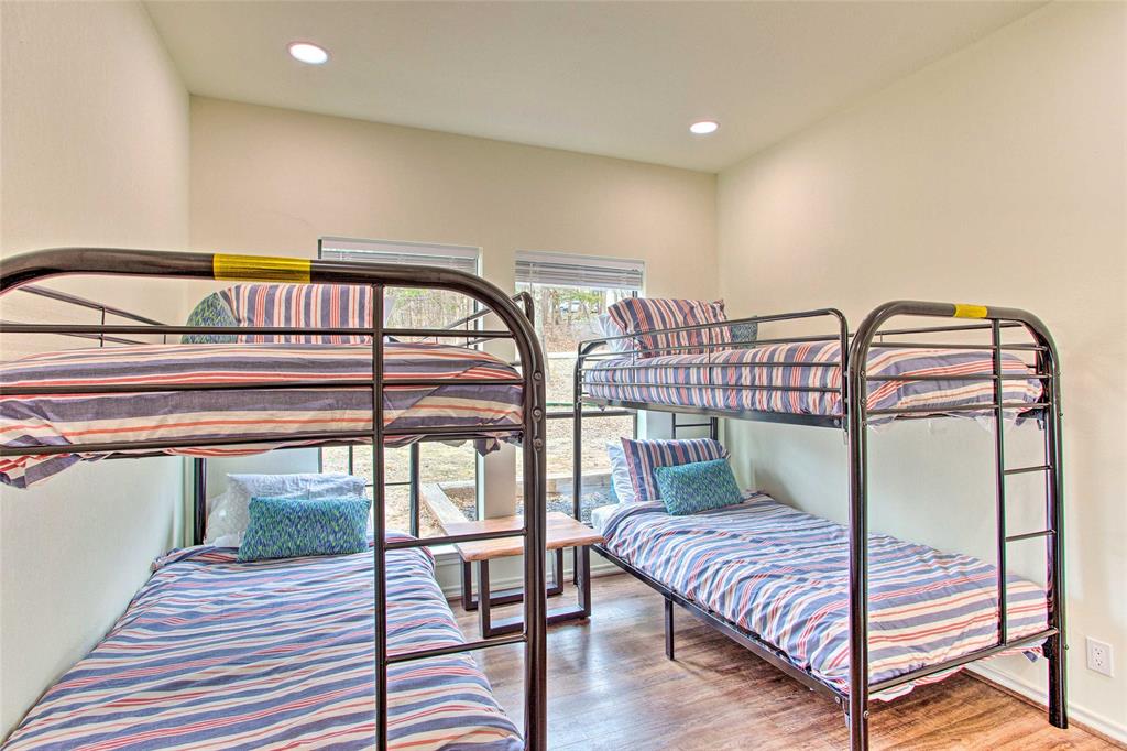 997 Tanglewood Trail Pottsboro, TX 75076 - Photo 12 of 35 Bedroom featuring recessed lighting, baseboards, and wood finished floors