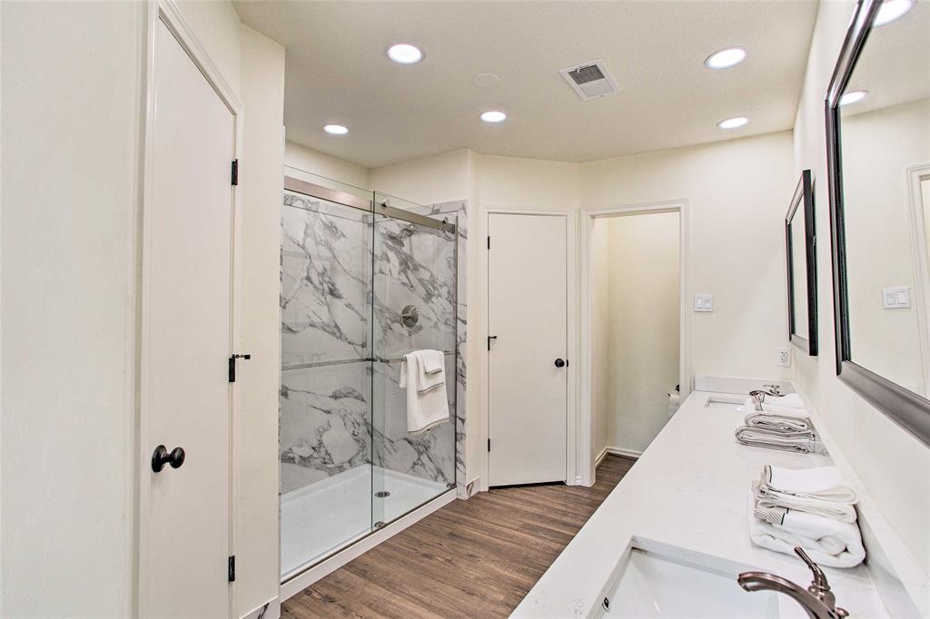 997 Tanglewood Trail Pottsboro, TX 75076 - Photo 14 of 35 Bathroom featuring a marble finish shower, recessed lighting, a sink, and wood finished floors