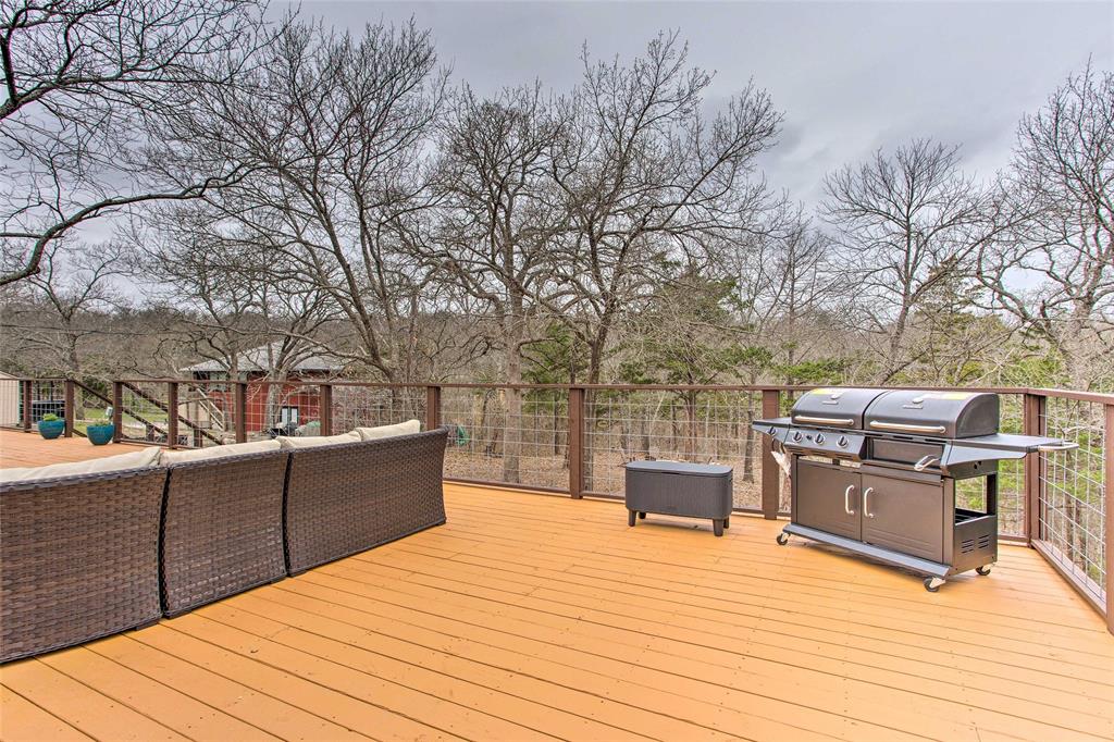 997 Tanglewood Trail Pottsboro, TX 75076 - Photo 15 of 35 Deck featuring grilling area and outdoor lounge area