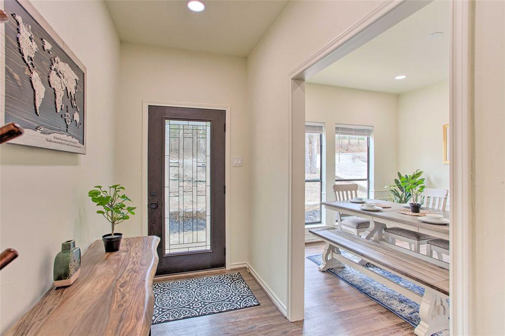 997 Tanglewood Trail Pottsboro, TX 75076 - Photo 20 of 35 Foyer entrance featuring recessed lighting, a wealth of natural light, baseboards, and wood finished floors