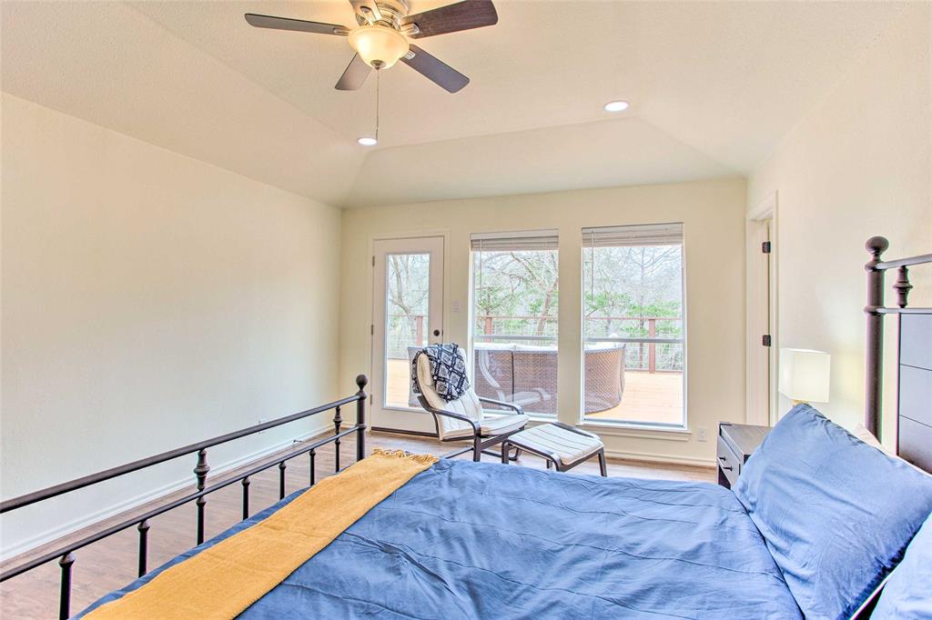 997 Tanglewood Trail Pottsboro, TX 75076 - Photo 24 of 35 Bedroom featuring baseboards, wood finished floors, a ceiling fan, and recessed lighting