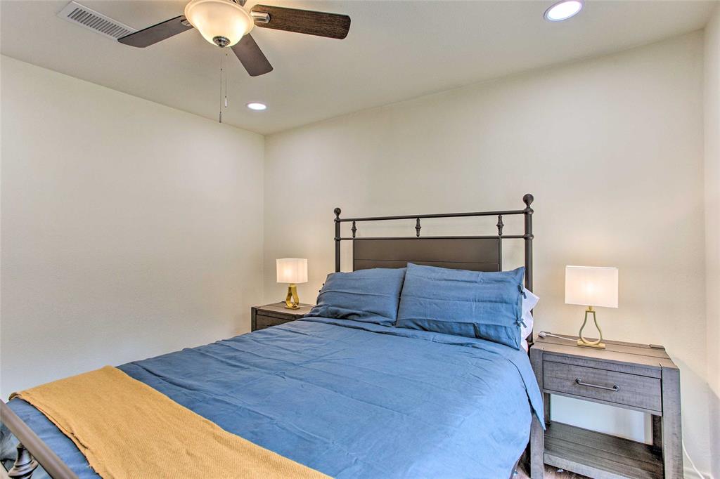 997 Tanglewood Trail Pottsboro, TX 75076 - Photo 30 of 35 Bedroom featuring ceiling fan, wood finished floors, visible vents, and recessed lighting