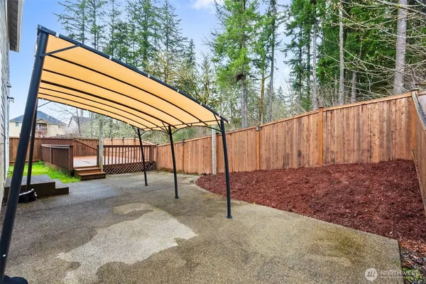 a backyard of a house with a mountain view