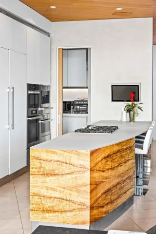 a view of a balcony with chair and table