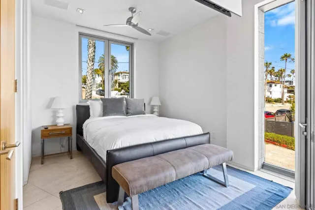 a bathroom with a tub shower and sink
