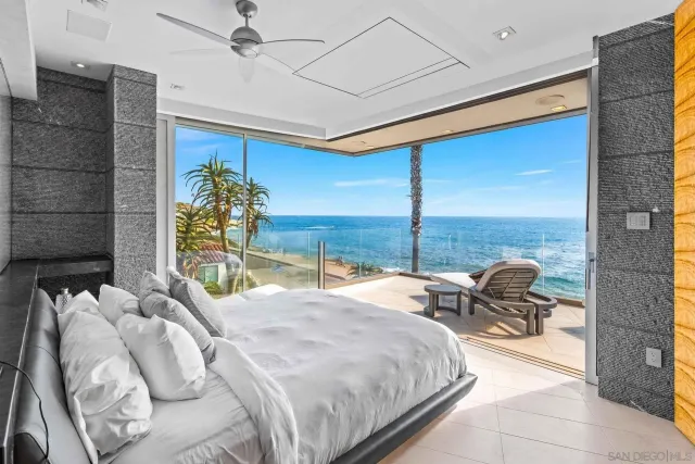 a bathroom with a toilet sink and shower curtain