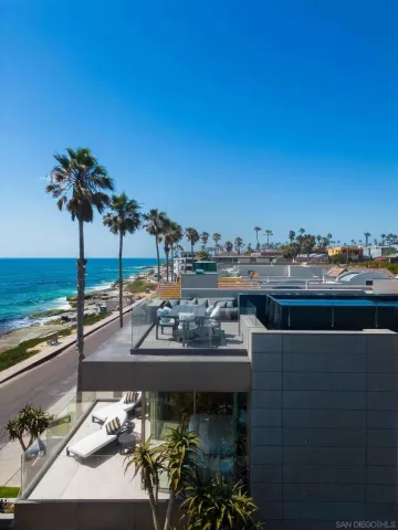 a view of a terrace with furniture and stove