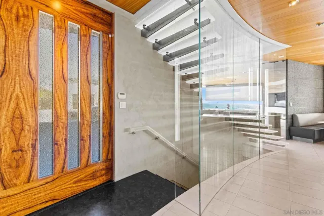 a bathroom with a tub and shower