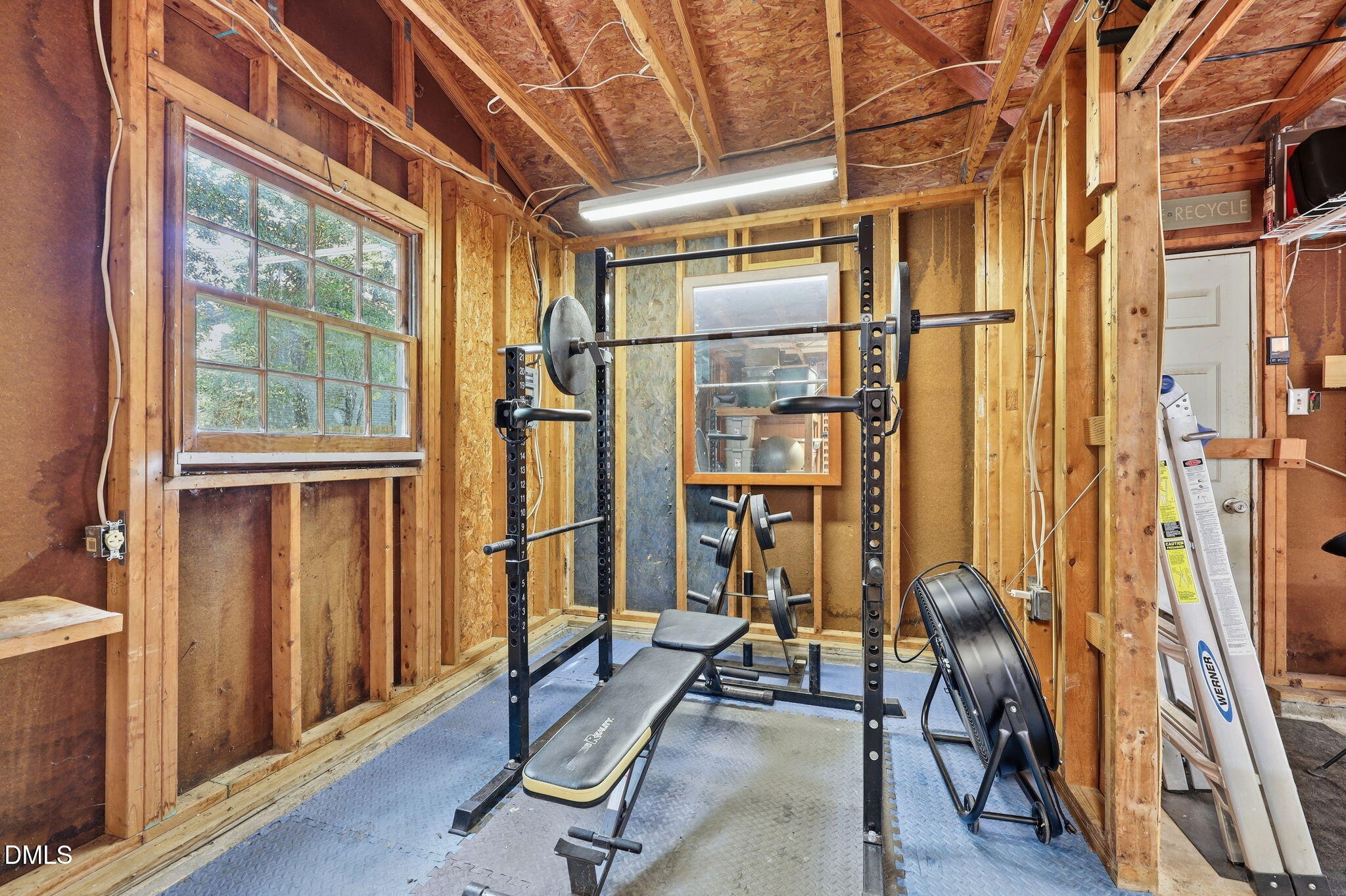 5501 Lacy Road Durham, NC 27713 - Photo 38 of 68 Garage storage/gym area