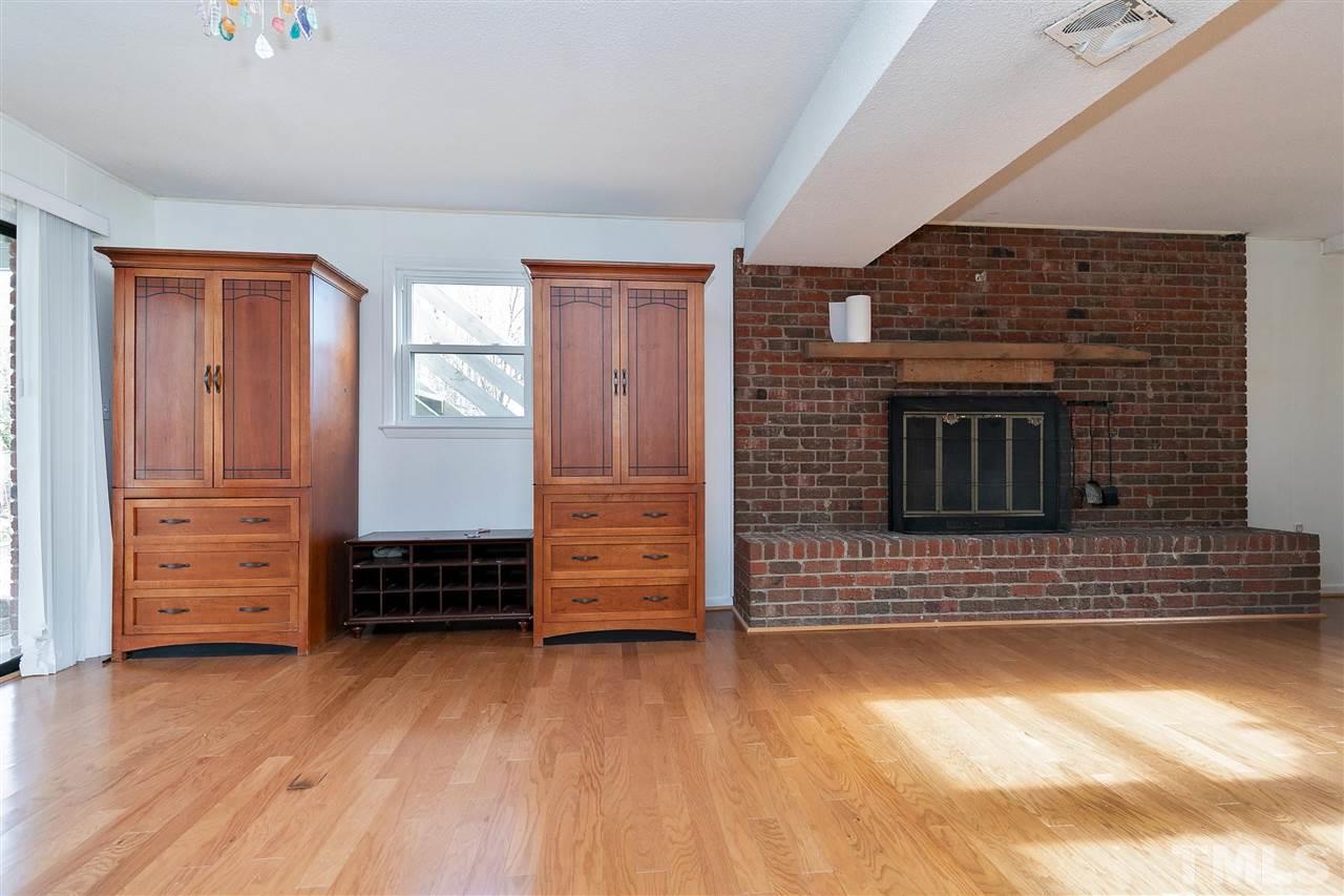 3105 Julian Drive Raleigh, NC 27604 - Photo 20 of 30 an empty room with wooden floor closet and windows