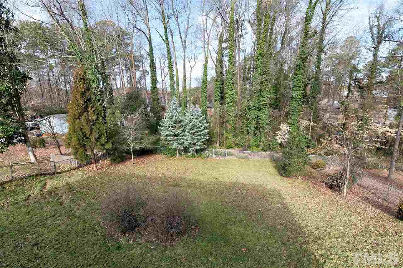 3105 Julian Drive Raleigh, NC 27604 - Photo 29 of 30 a view of a yard with large trees