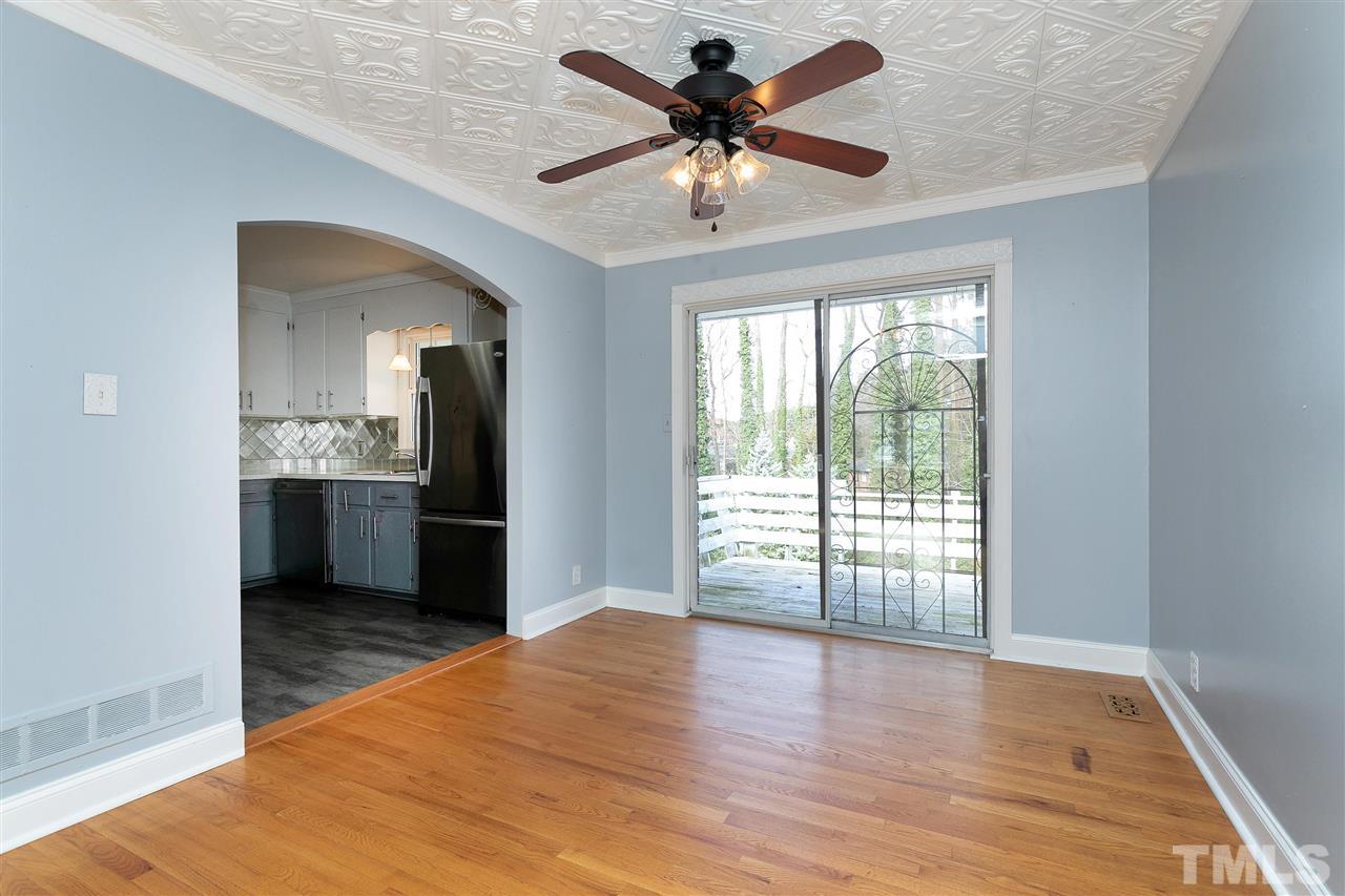 3105 Julian Drive Raleigh, NC 27604 - Photo 6 of 30 wooden floor in an empty room with a window