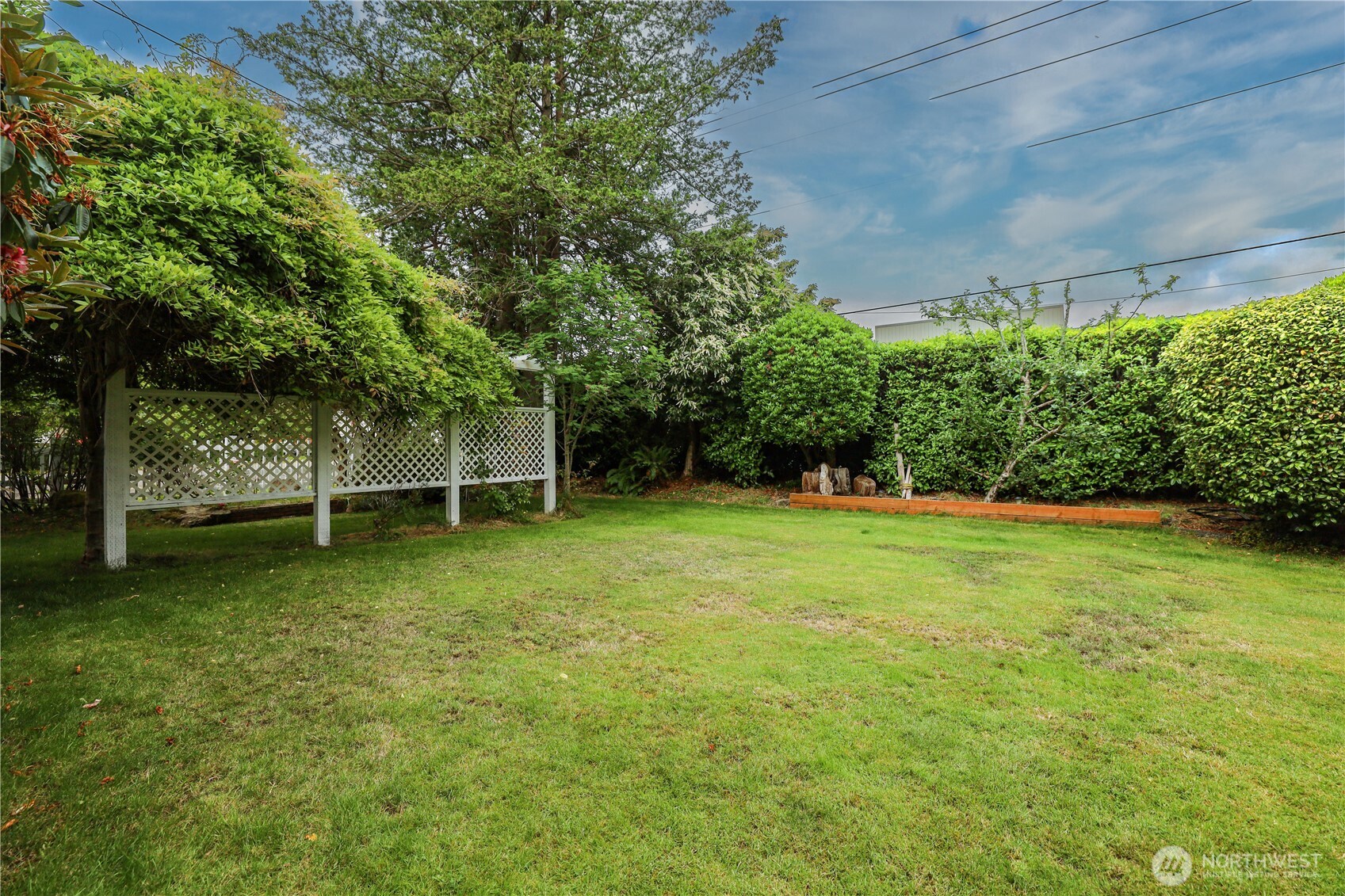 505 K Street Hoquiam, WA 98550 - Photo 28 of 40 a view of a backyard with a garden
