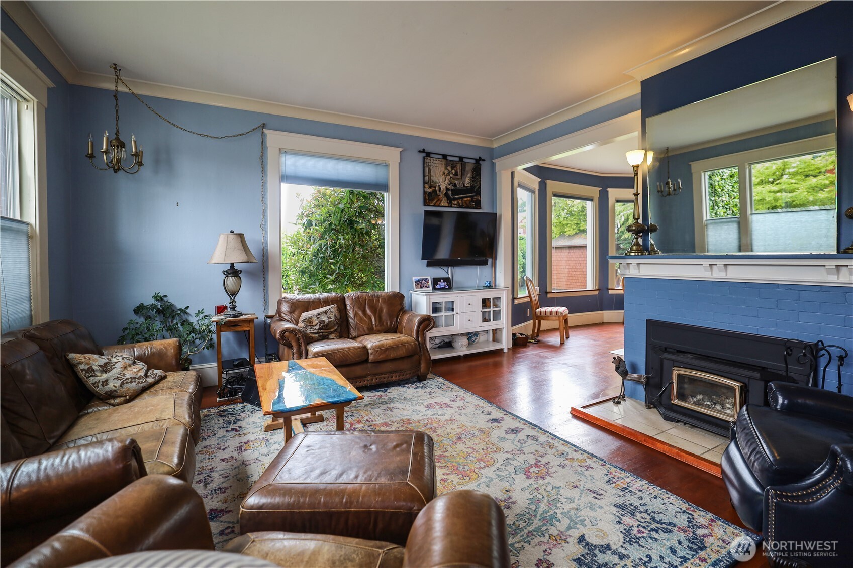 505 K Street Hoquiam, WA 98550 - Photo 3 of 39 a living room with furniture fireplace and a large window