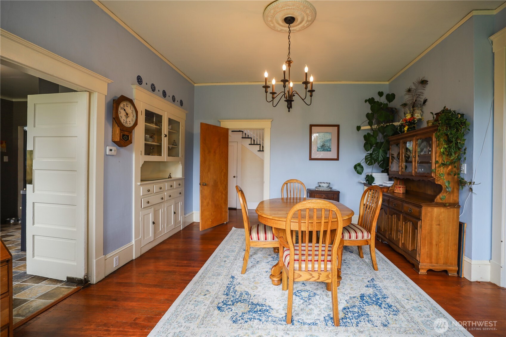 505 K Street Hoquiam, WA 98550 - Photo 5 of 39 a dining room with furniture a chandelier and wooden floor