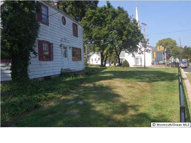 148 Tindall Road Middletown, NJ 07748 - Photo 2 of 3 a black and white photo of a house