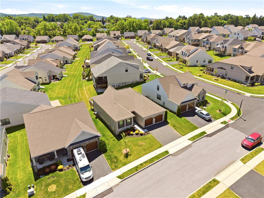 4120 Eveningstar Road Emmaus, PA 18049 - Photo 58 of 62 An aerial perspective reveals a harmonious neighborhood of modern homes nestled amidst lush green lawns.