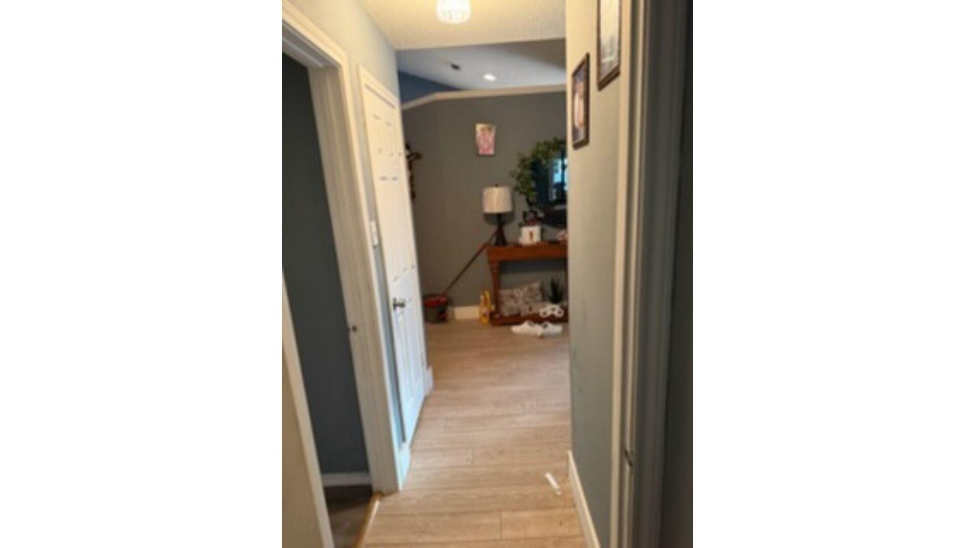 4520 Wedgecrest Drive Dallas, TX 75232 - Photo 13 of 19 a view of a hallway with toilet and a workspace