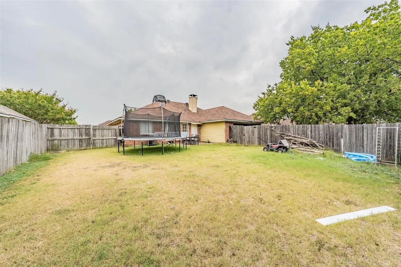 4520 Wedgecrest Drive Dallas, TX 75232 - Photo 19 of 19 a front view of house with yard and seating