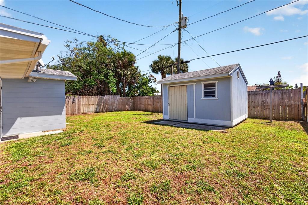 47 Carol Road Ormond Beach, FL 32176 - Photo 36 of 54 a house view with a backyard space