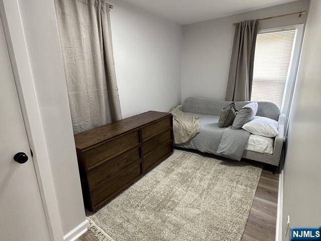 195 Valley Road, Unit 1 Clifton, NJ 07013 - Photo 4 of 8 a living room with furniture and a window