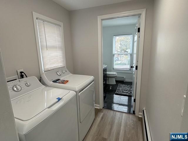 195 Valley Road, Unit 1 Clifton, NJ 07013 - Photo 7 of 8 a utility room with dryer and washer