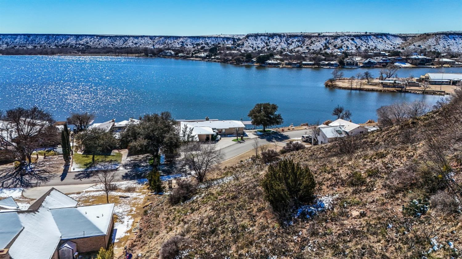 26 East Lakeshore Drive Ransom Canyon, TX 79366 - Photo 4 of 9 a view of a lake