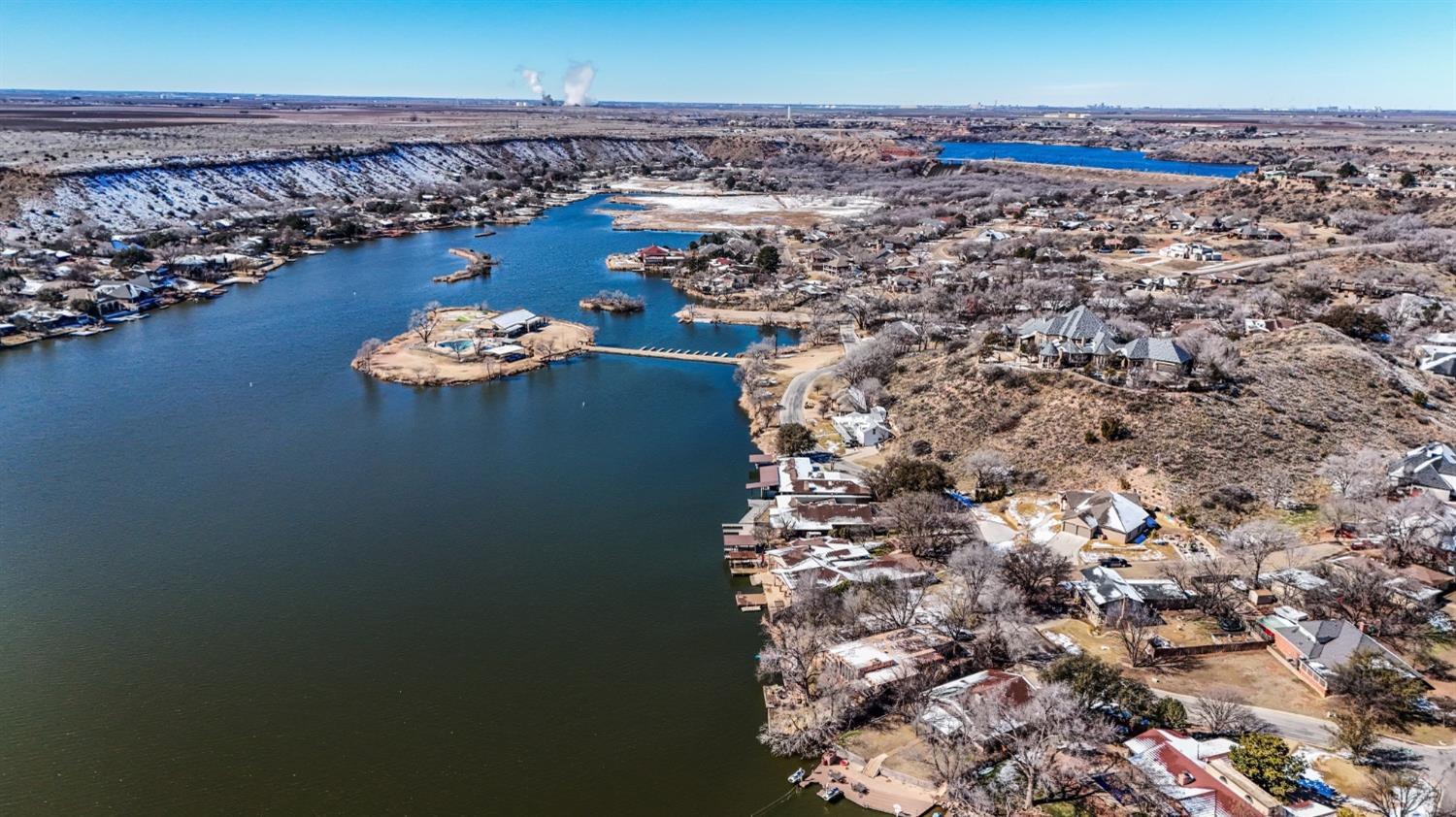 26 East Lakeshore Drive Ransom Canyon, TX 79366 - Photo 8 of 9 a view of a room with a fireplace