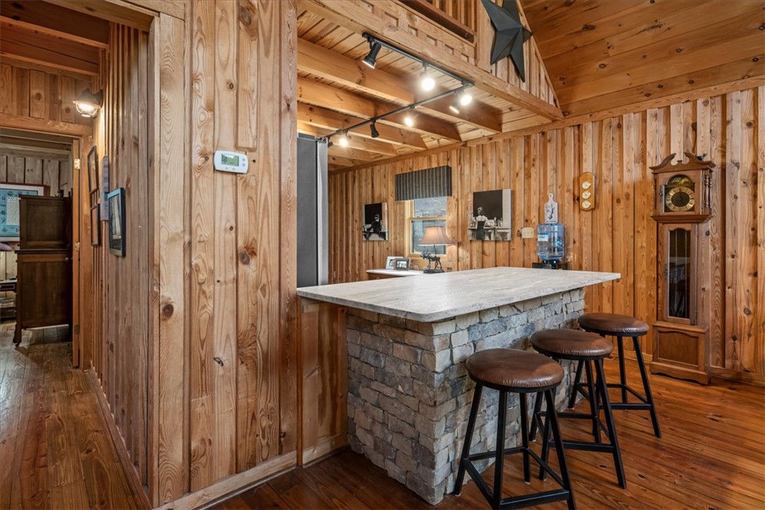 109 Carolina Cove Road Seneca, SC 29672 - Photo 12 of 45 Leather finish granite and stacked stone island.