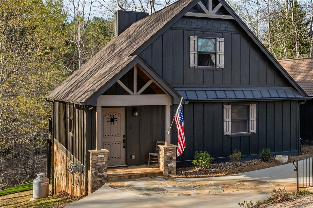 109 Carolina Cove Road Seneca, SC 29672 - Photo 2 of 45 This charming home offers a striking facade with classic architectural details.