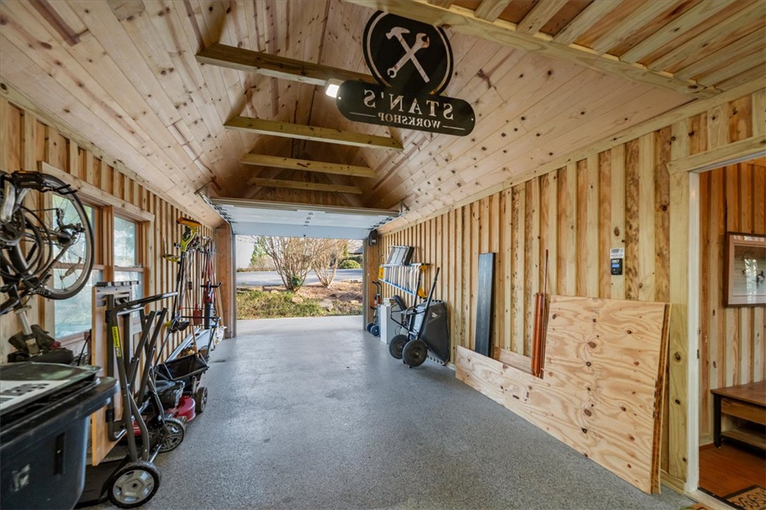 109 Carolina Cove Road Seneca, SC 29672 - Photo 39 of 45 Epoxy garage floor and workshop space. Tool boxes can remain with the home.