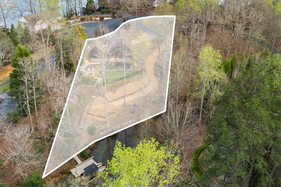 109 Carolina Cove Road Seneca, SC 29672 - Photo 41 of 45 Aerial view of .61 acre property, featuring a private yard and serene waterfront access. Over 100 feet of shoreline