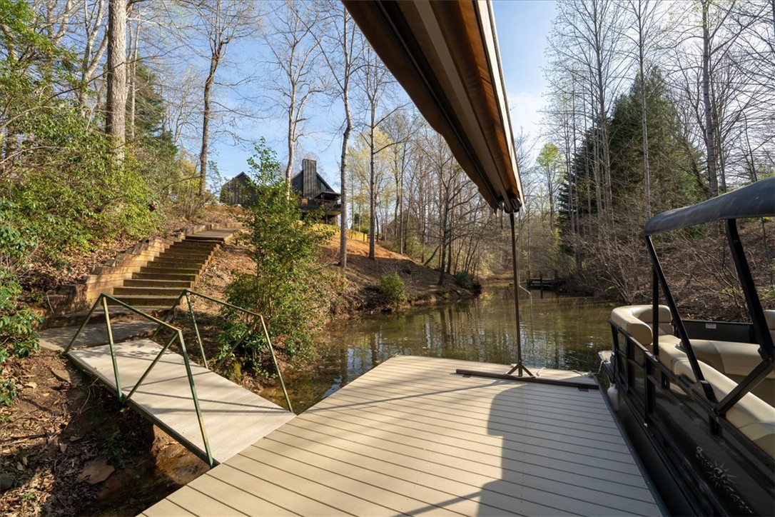 109 Carolina Cove Road Seneca, SC 29672 - Photo 42 of 45 Private dock with new cement plank decking and new electric awning. Plenty of water depth for your boat!
