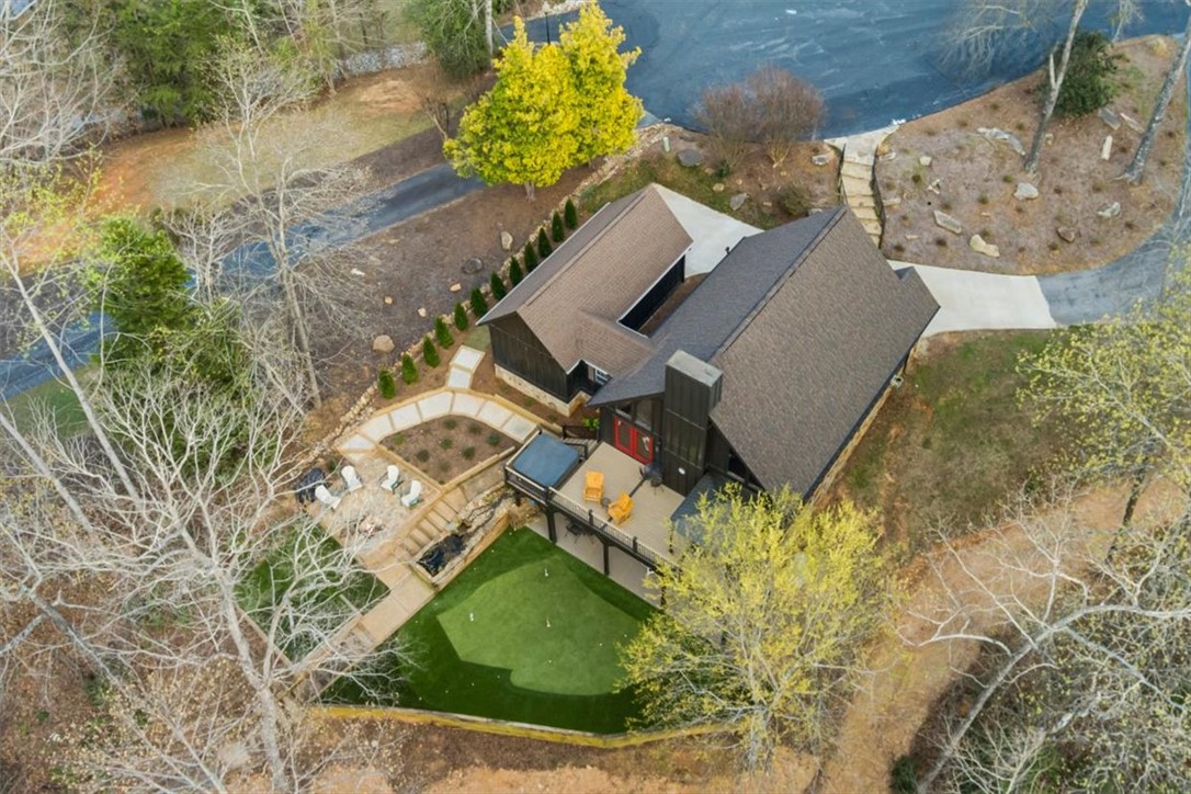 109 Carolina Cove Road Seneca, SC 29672 - Photo 6 of 45 This spacious property offers a putting green and expansive deck, PERFECT for outdoor recreation and short term renters!