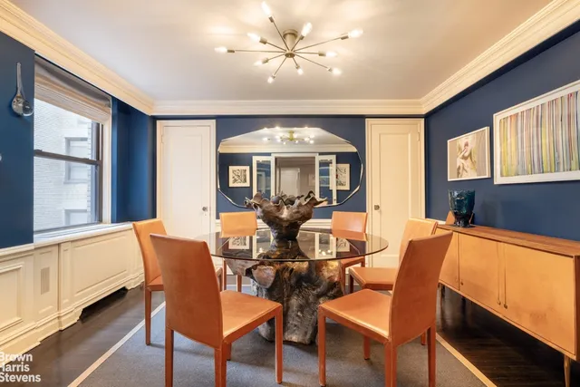 a kitchen with a sink stainless steel appliances and cabinets