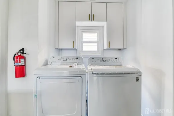 a kitchen with stainless steel appliances granite countertop a refrigerator sink and cabinets