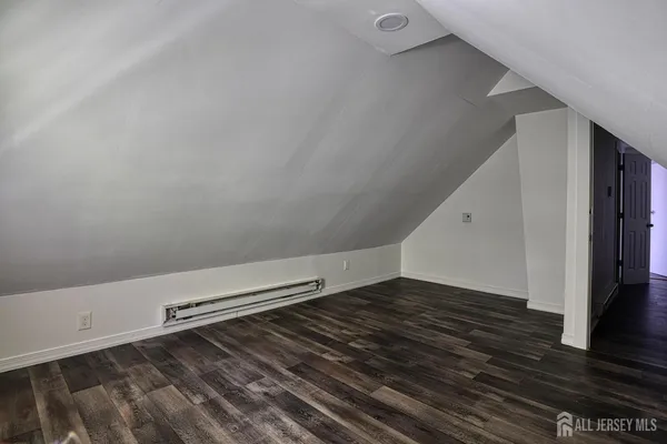 a bathroom with a sink and a shower