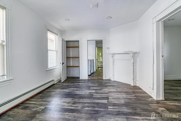 a view of a room that has a window in it