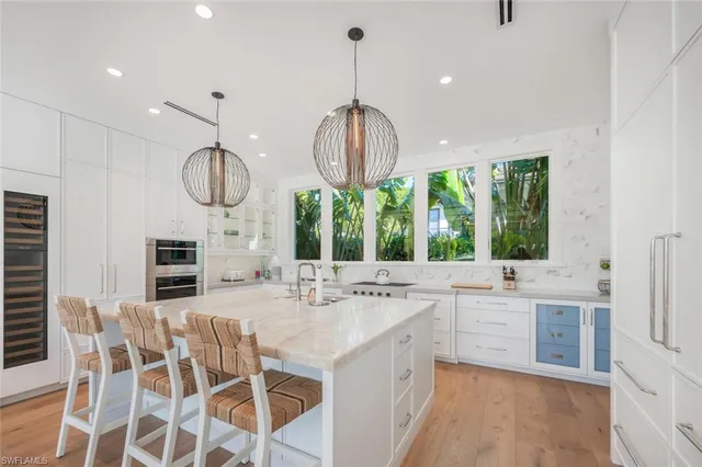 a bathroom with a toilet a sink and a mirror