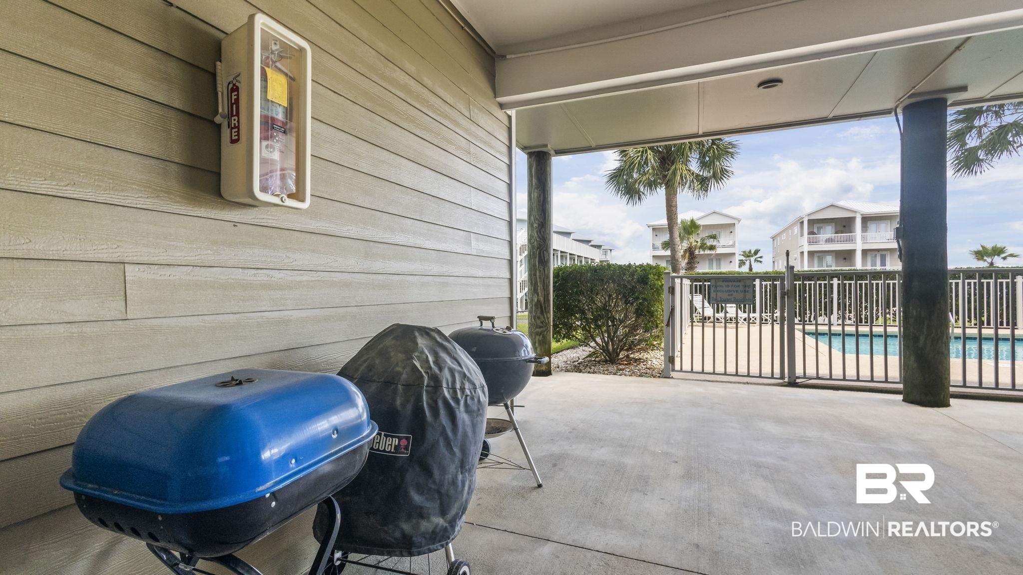 25909 Canal Road, Unit 203 Orange Beach, AL 36561 - Photo 35 of 36 View of patio featuring a grill