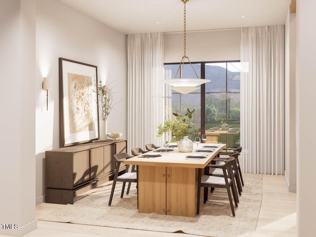 8016 Penny Road Raleigh, NC 27606 - Photo 13 of 23 a view of a dining room with furniture window and outside view