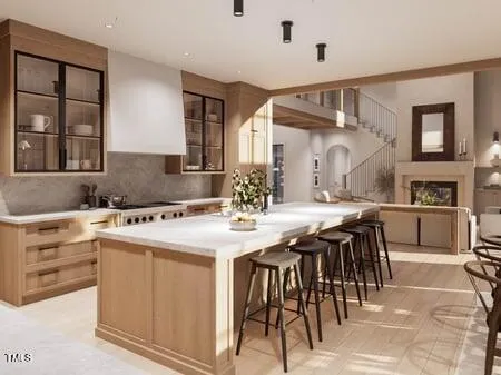 a kitchen with a sink and cabinets