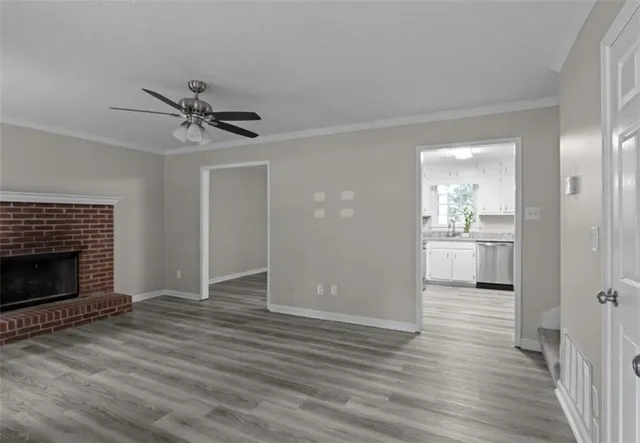a view of a hallway with a kitchen