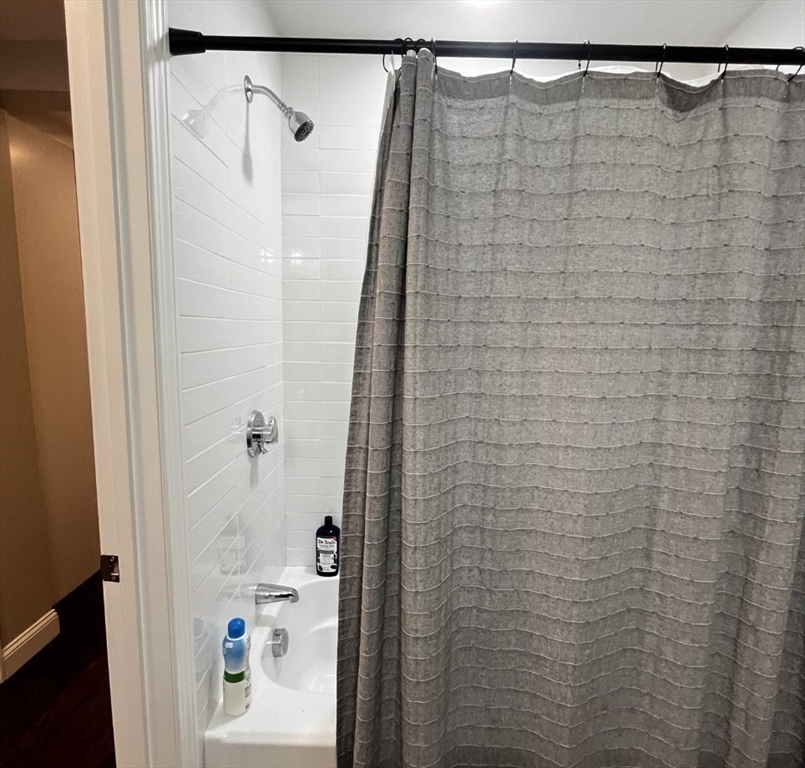 229 Maverick Street, Unit 1 Boston, MA 02128 - Photo 18 of 20 a bathroom with a shower