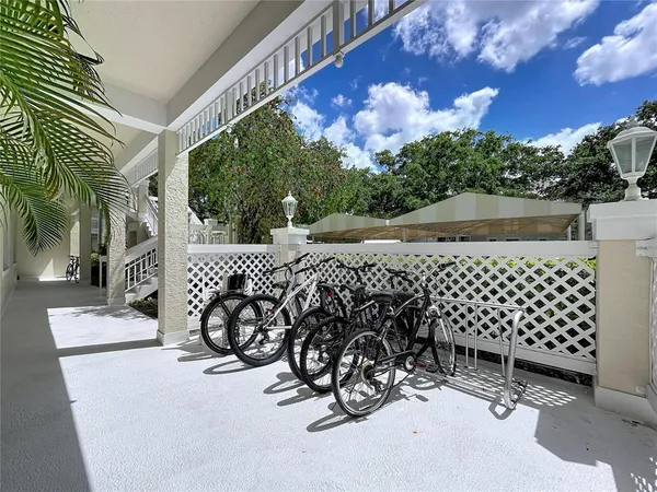 an aerial view of a house with garden space and street view