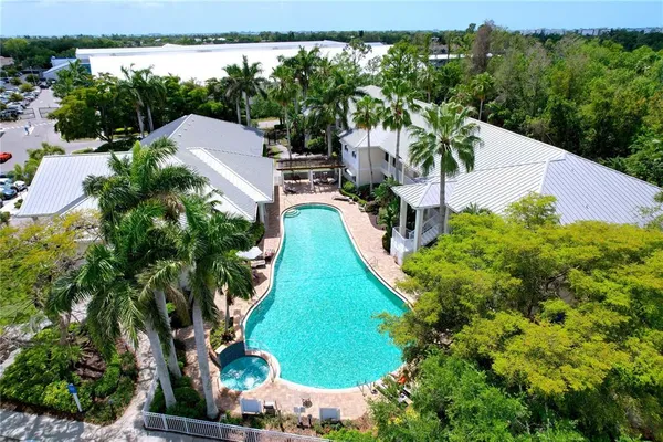 an aerial view of a house with a garden