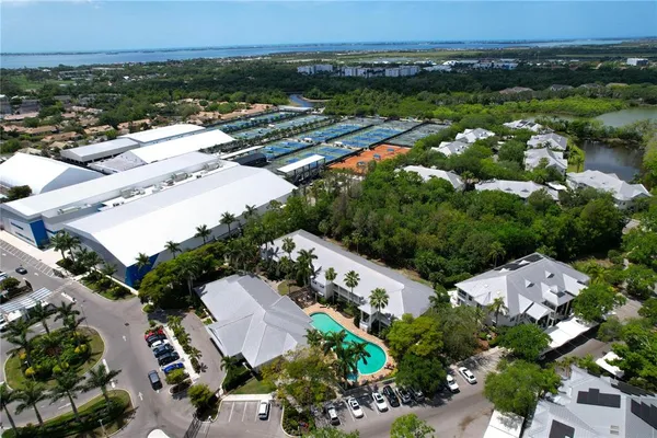 a view of a pool with a yard